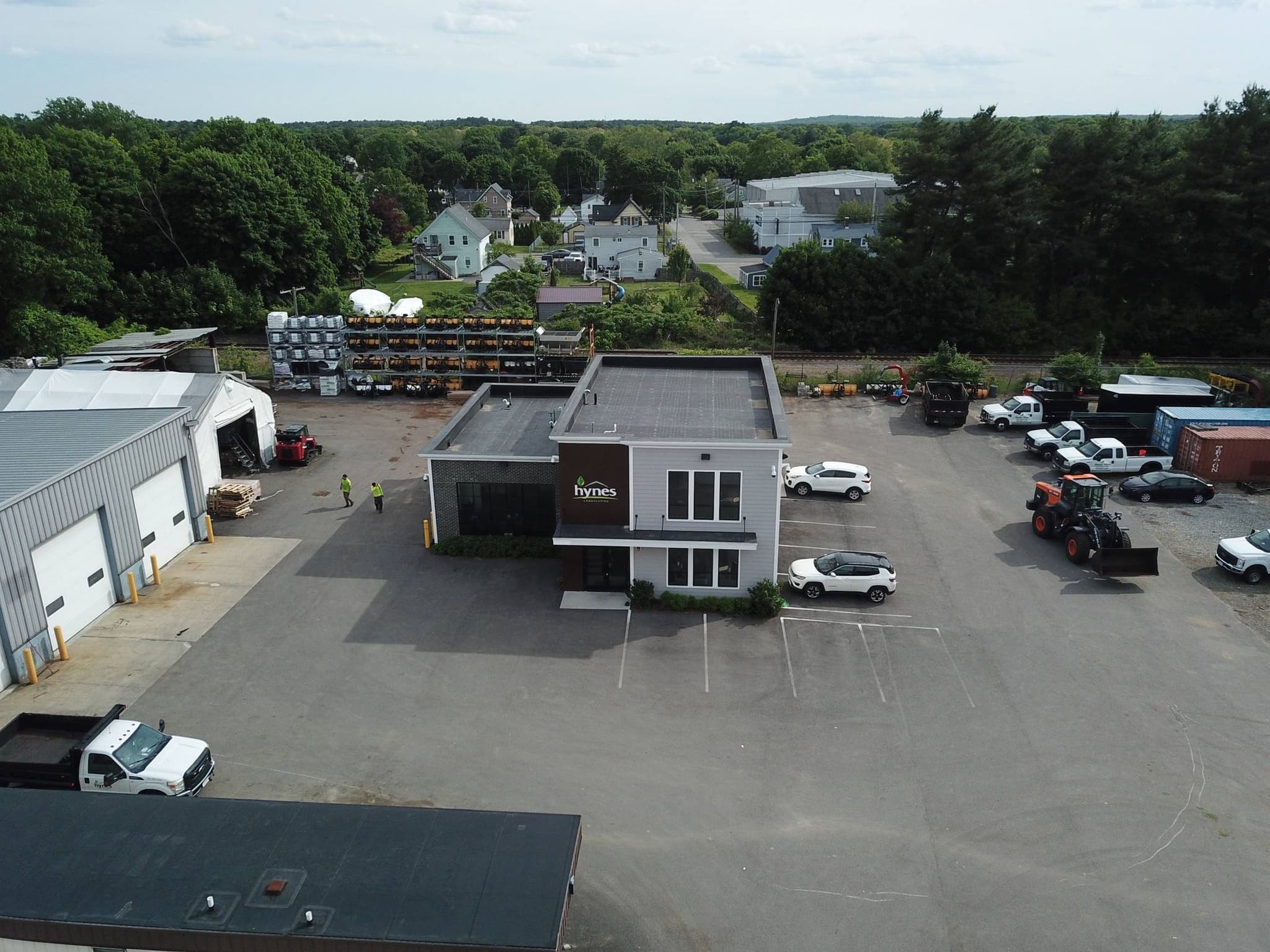 Aerial view of the Hynes Landscaping headquarters and fleet yard at 118 Cushing Street, Stoughton, MA